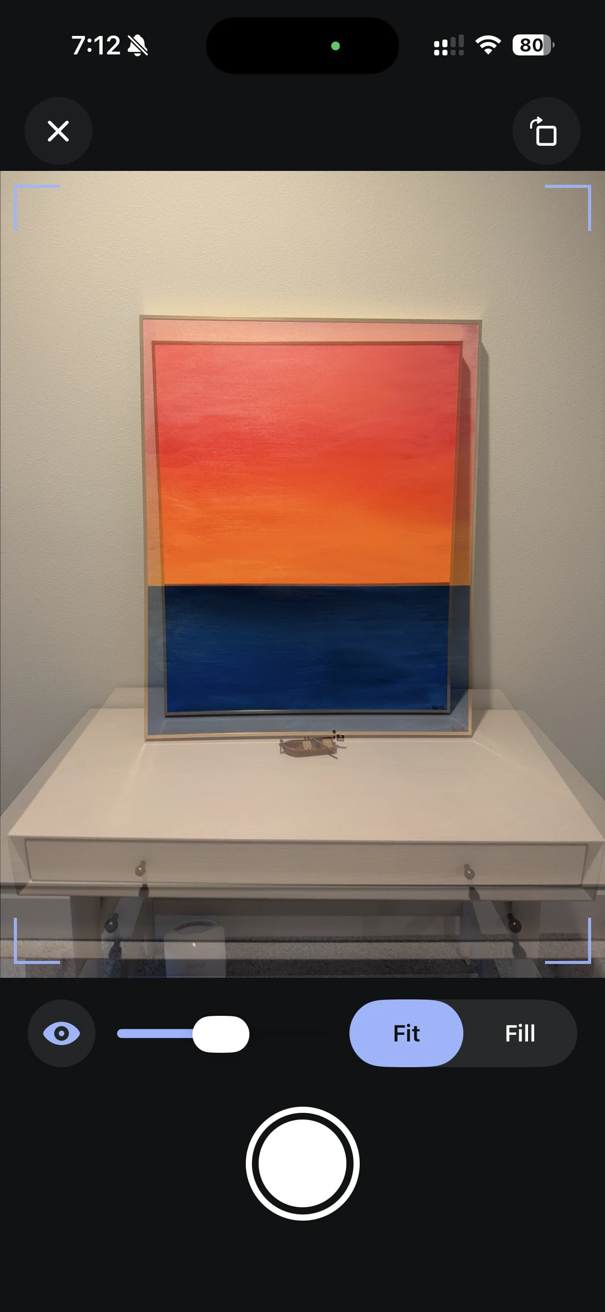 FrameAgain live camera showing a reference photo as a translucent framing guide